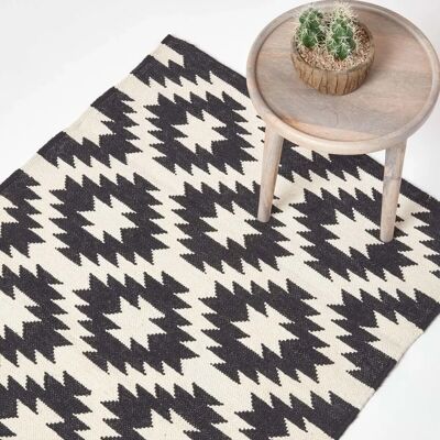 Tapis Kilim tissé à la main en coton noir et blanc Homescapes Zurich - Tapis Kilim - Publicité Tapis Kilim tissé à la main en coton noir et blanc Homescapes Zurich - Tapis Kilim - Publicité