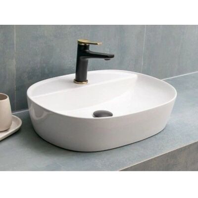 Lavabo ovale en céramique blanche Kamalu - Salle de bains - Publicité Lavabo ovale en céramique blanche Kamalu - Salle de bains - Publicité