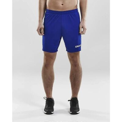 Craft Squad Solid 19055721346 Granatowe/spiżowe spodenki - Shorts Craft Squad Solid 19055721346 Granatowe/spiżowe spodenki - Shorts