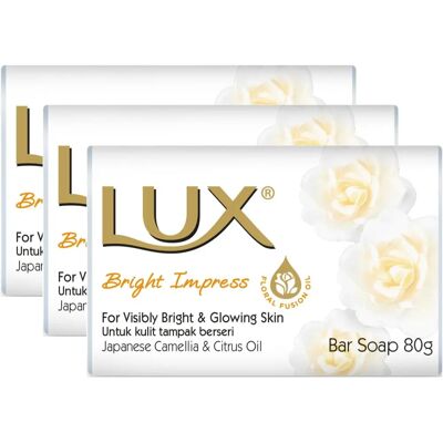 Savon en barre Lux Bright Impress avec camélia et agrumes - Savon - Publicité Savon en barre Lux Bright Impress avec camélia et agrumes - Savon - Publicité